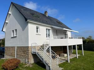 Maison familiale face à la mer