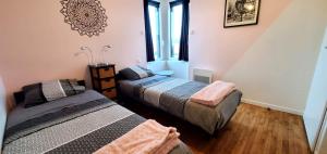 Appartements Gite Le Tiguidou : photos des chambres