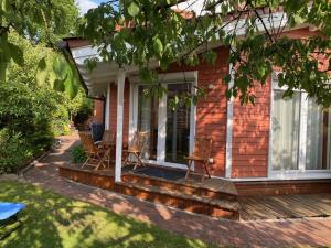 Moderne Ferienwohnung mit Kamin u Garten im EG 100qm Nähe Weser und Golfplatz