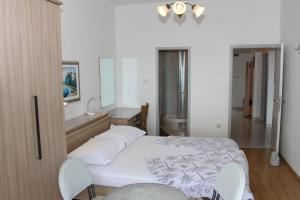 Apartments by the sea Podgora - Makarska - 21378