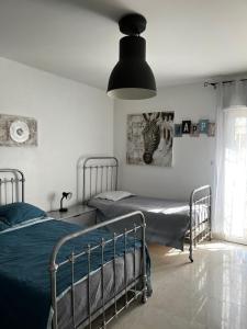 Sejours chez l'habitant LAubergerie de Lastours : photos des chambres