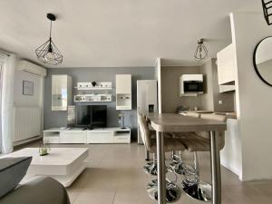 Appartements GROOMI Le Terrasse en Mer- Clim, parking et bord de mer ! : photos des chambres