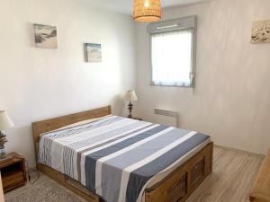 Appartements Korrigans - Spacieux Rez de jardin - T204 : photos des chambres