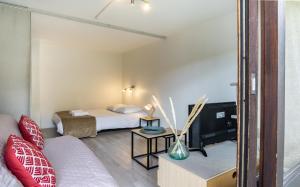 Appartements Saint-paul cosy studio avec place de parking privee : photos des chambres