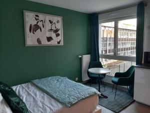 Appartements Le Cocon Vert : photos des chambres