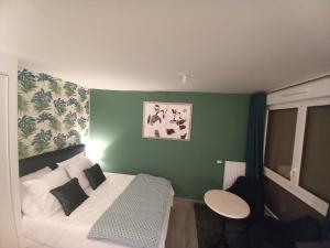 Appartements Le Cocon Vert : photos des chambres