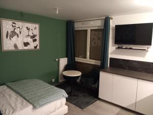 Appartements Le Cocon Vert : photos des chambres