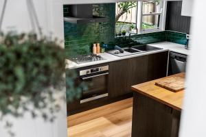 Tawny frog mouth in the trees