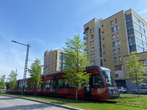 Near center w smart-TV, tram stop and gym visit