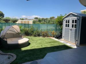 Joli studio climatisé avec Jardin dans résidence avec piscine