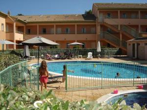 Appartements Grazioso bilocale a 200 m dal mare in residence con piscina e WI-FI : photos des chambres