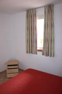 Appartements Grazioso bilocale a 200 m dal mare in residence con piscina e WI-FI : photos des chambres