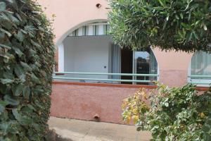 Appartements Grazioso bilocale a 200 m dal mare in residence con piscina e WI-FI : photos des chambres