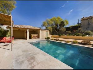 Appartements Le petit Mazet du Domaine avec sa piscine : photos des chambres