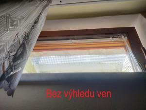 Suterénní pokoj v Penzionu Kubu