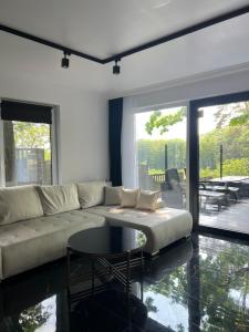 "Apollo" - domki, apartamenty i pokoje z klimatyzacją