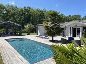 Villas Villa avec piscine chauffee proche plage Oceane : photos des chambres