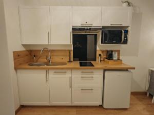 Appartements Studio tout confort, 8min a pied du Futuroscope : photos des chambres
