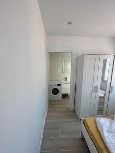 Appartements Charmant T2, logement neuf, climatise au calme . : photos des chambres