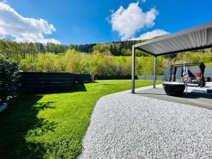 Voralpen Lodge - Ferienhaus mit Gym & Wellnessbereich