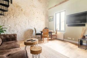 Appartements L'echoppe Bergeracoise, Salle de jeux, Climatisation et terrasse : photos des chambres