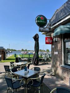 LODGE, een super knus tiny house, nabij vaarwater en haven!