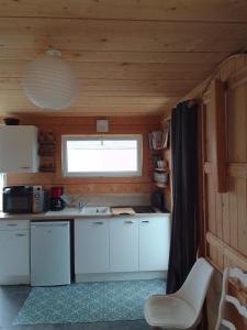 Appartements Tiny house dans jardin arbore : photos des chambres