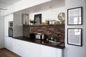 Appartements Le Pozzi, parking prive plein centre : photos des chambres