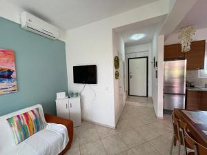 Cozy Beachfront Maisonette Offers Panoramic Views of Sea