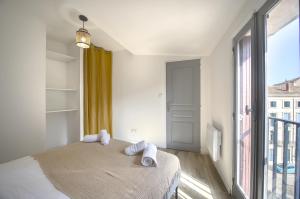 Appartements La Garrigue - Centre-Ville - Arrivee Autonome : photos des chambres