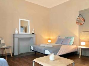 Appartements LE ORANGE - Confort - Wifi - Entre Gare et Centre : photos des chambres