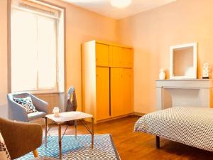 Appartements LE ORANGE - Confort - Wifi - Entre Gare et Centre : photos des chambres