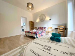 Appartements LE DECO - Confort - Wifi - Luminosite - Entre gare et Centre : photos des chambres