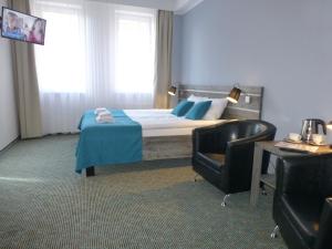 Deluxe Queen Room with Two Queen Beds room in Hotel Giżycko