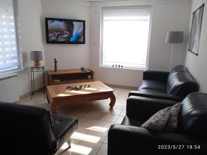 Appartements Comme a la maison : photos des chambres
