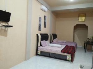 FURQAN GUEST HOUSE Family