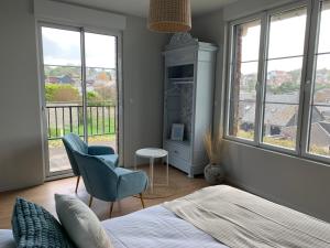 Appartements LE NID SUR LA FALAISE : photos des chambres