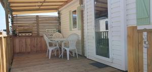 Campings MH135 camping TOHAPI NOVELA - Mobil home 5p climatise - : photos des chambres