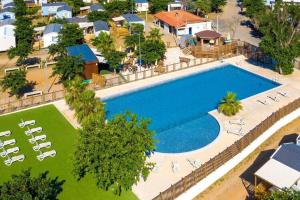 Campings MH135 camping TOHAPI NOVELA - Mobil home 5p climatise - : photos des chambres