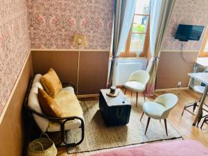 Appartements Une maison de famille : photos des chambres