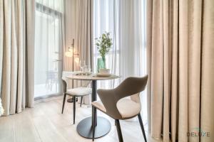Classic Studio at Mesk 1 Midtown Dubai Production City by Deluxe Holiday Homes