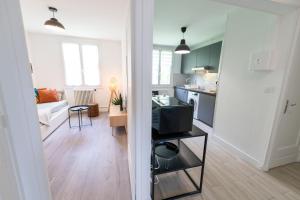 Appartements KASA SERENITY - Tout equipe - 3 TV : photos des chambres