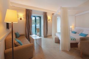Quadruple Room with Sea View room in Hotel Playa Sol