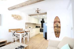 Appartements Vaiana YourHostHelper : photos des chambres