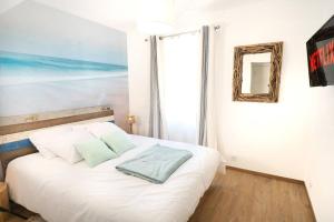 Appartements Vaiana YourHostHelper : photos des chambres