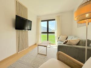 Apartament de disseny rústic amb vistes by RURAL DÀNEU