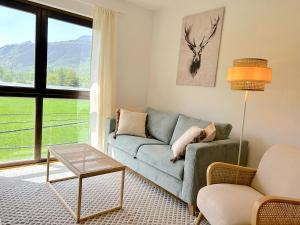 Apartament de disseny rústic amb vistes by RURAL DÀNEU