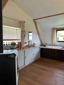 Chalets Cosy maison solaire + jacuzzi a la Ferme : photos des chambres