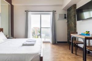 Antonios Place, 3 mins to Mactan Airport, Fast Internet, Netflix, Pool, Gym
