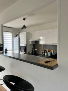 Appartement une chambre proche centre ville et transports